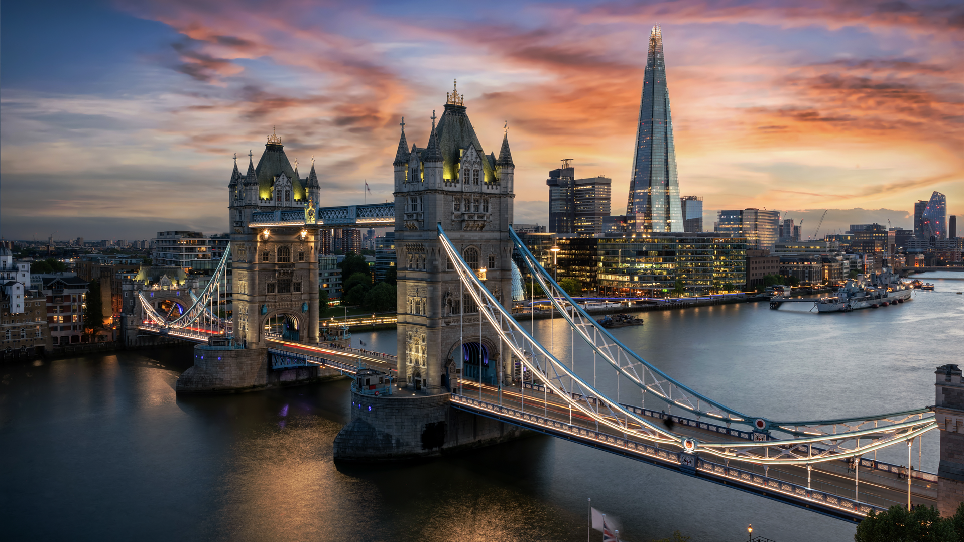 Tower Bridge at sunset with London skyline